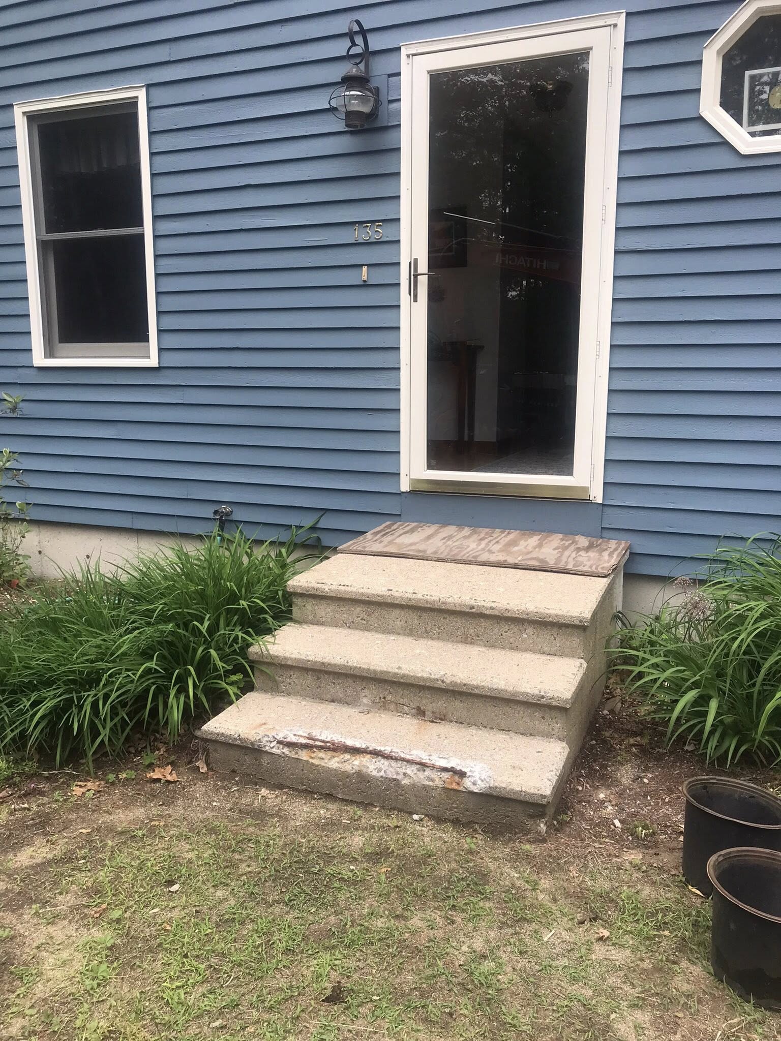 Worn concrete steps before rehabilitation